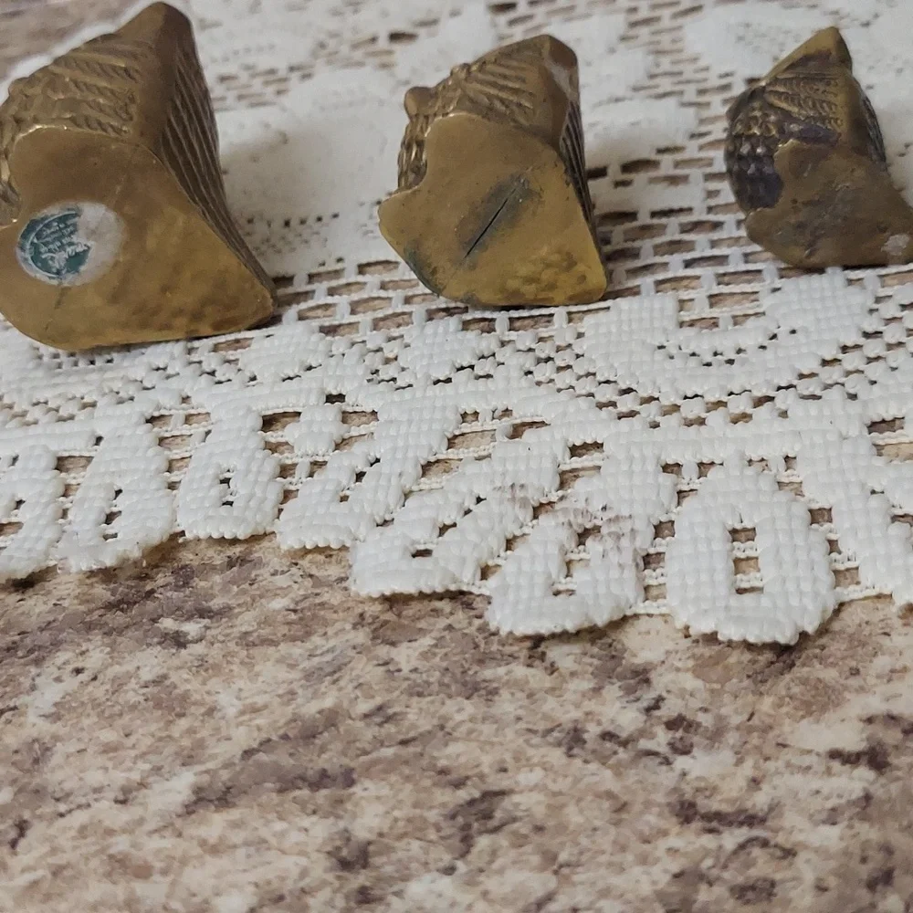 Bronze owl trio